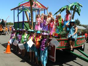 The Palms team and family members getting ready for the Santa Parade